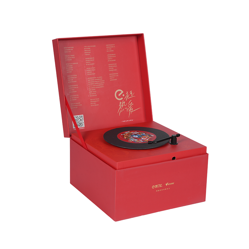 Harte, buchförmige, rotierende Spieluhr mit Feiertagsmotiv